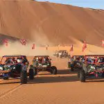 UTVs on sand dunes in the desert