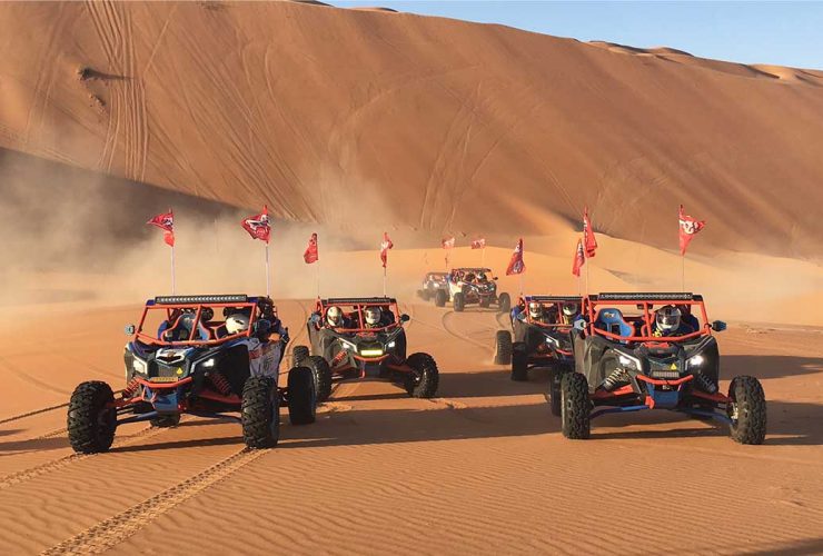 UTVs on sand dunes in the desert