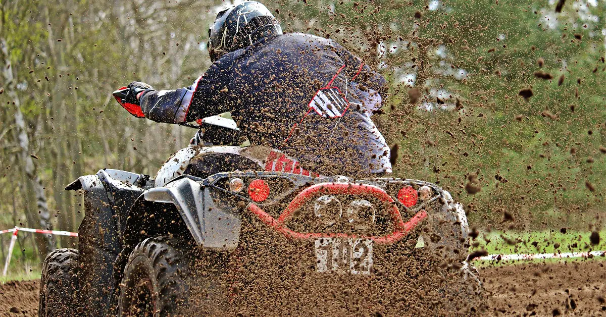 ATV riding in mud