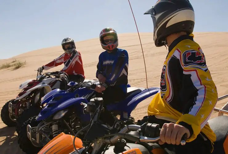 Affordable ATV models riding in the desert