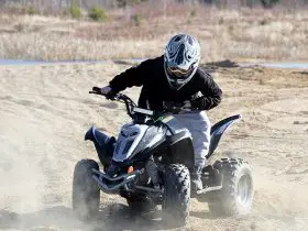A young ATV rider on a Kazuma 150cc