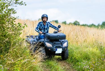A man rides a beginner-friendly ATV for the first time