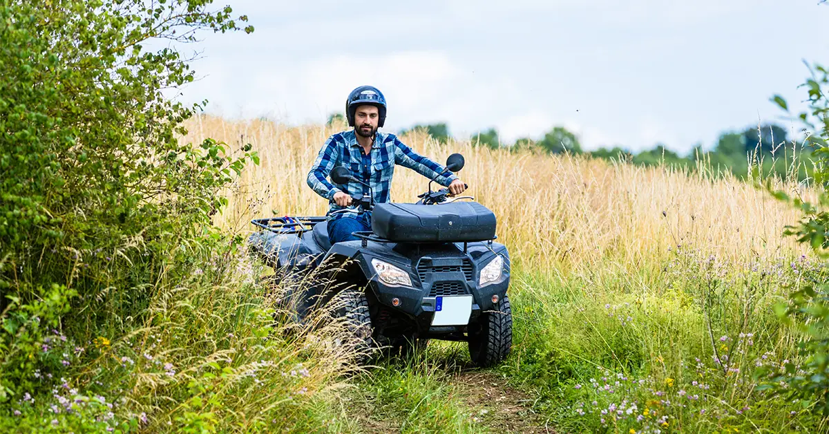 A man rides a beginner-friendly ATV for the first time