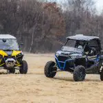 Two UTVs with different windshields
